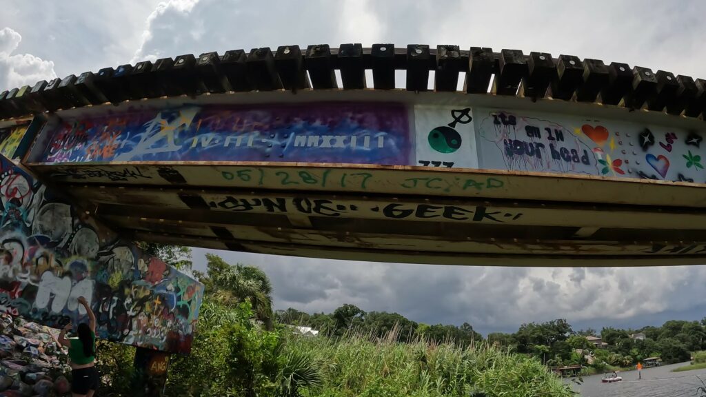 Overhead Graffiti on Train Trestle