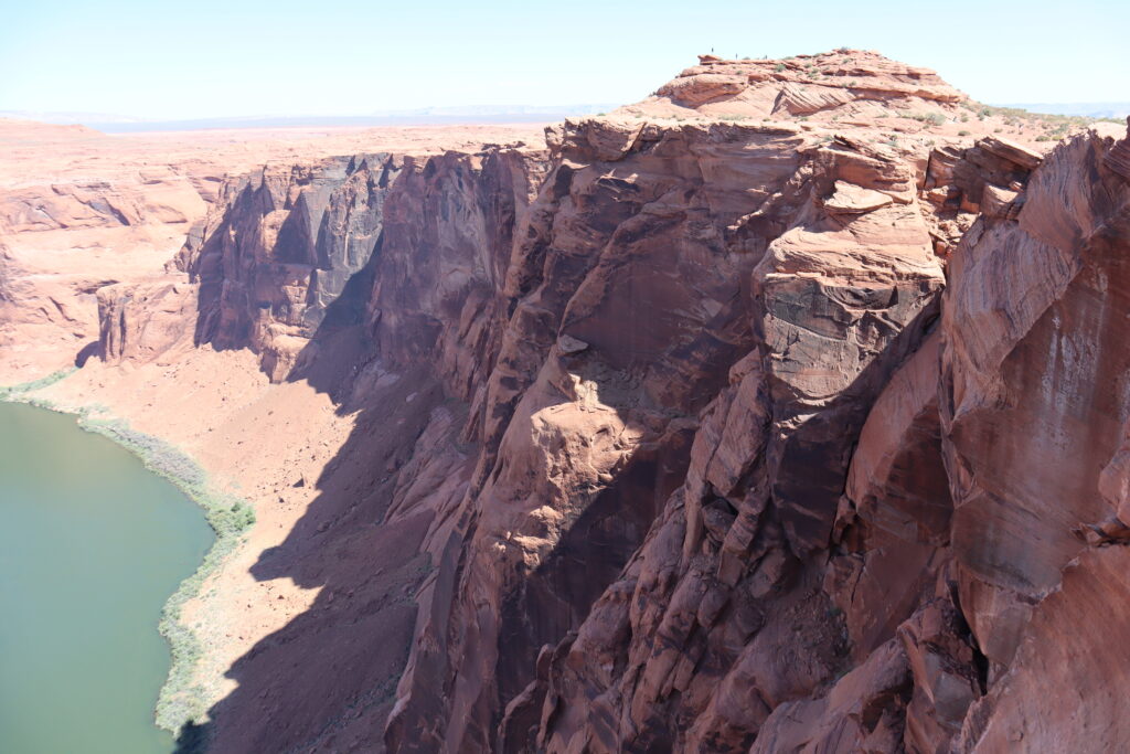 People in the Distance on the Rocks