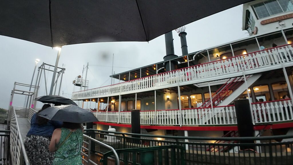 Boarding the Steamboat Natchez in a Pouring Rain