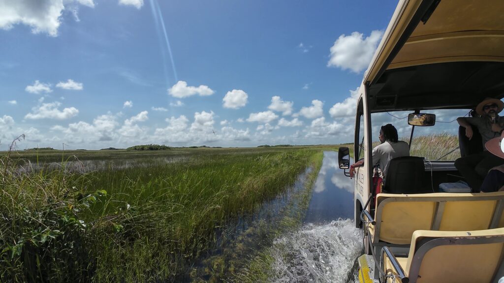 Driving through the Water Flowing Over the Top of the Tram Path